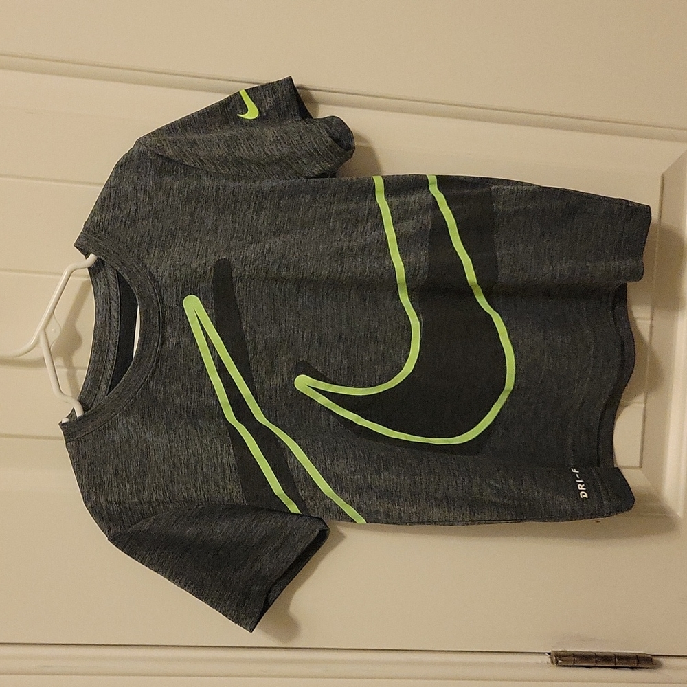 Nike, Dri-Fit, size 7, short sleeve in gray.